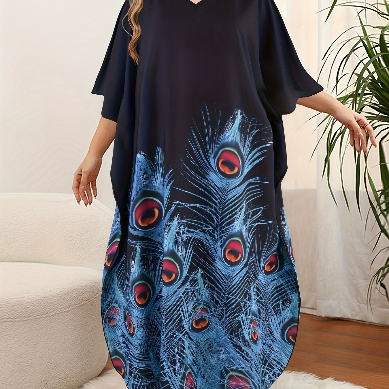 Plus size kaftan dress for women with V-neck print and short batwing sleeves. Loose fit with long length, slit, and made from polyester and elastane. Ideal for spring, summer, and fall