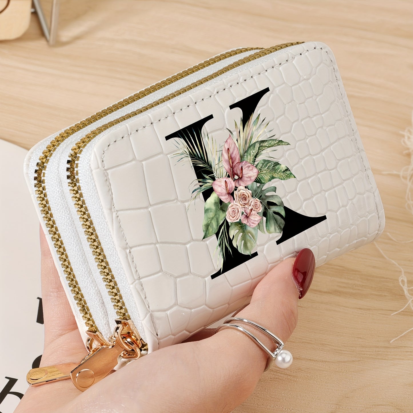 Women's credit card wallet with elegant floral letter print in black & white. Features large capacity, dual zipper, crocodile texture PU, lightweight design with nylon lining for everyday