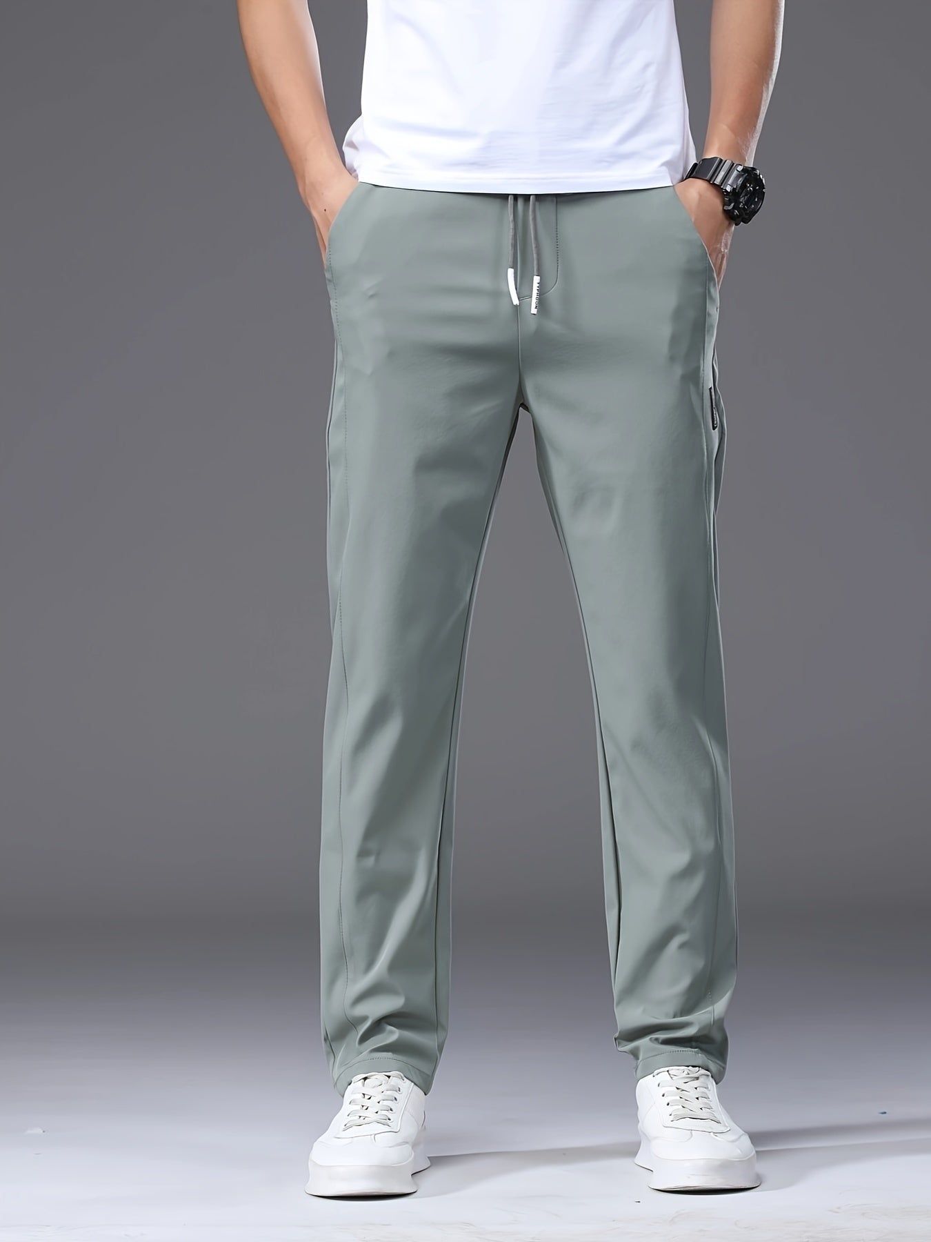 Men's slim fit drawstring sports pants, lightweight quick-dry trousers for summer leisure wear.