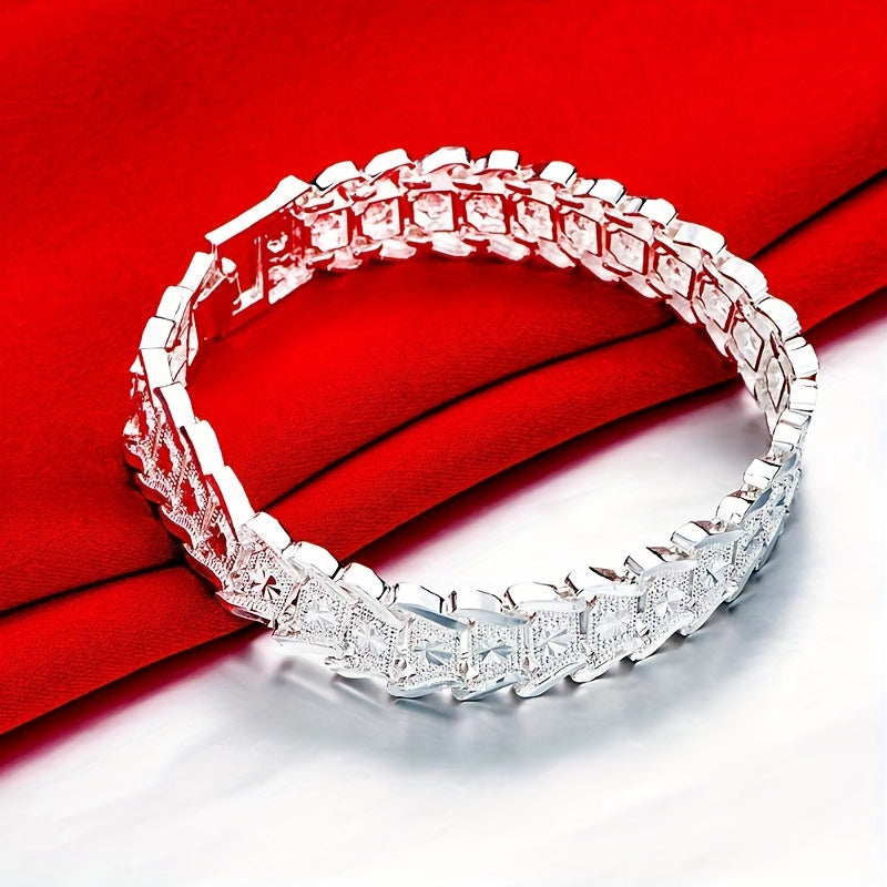 A hypoallergenic 925 sterling silver bracelet with a wide coin design, perfect for everyday wear and special occasions. Ideal for Mother's Day gift.