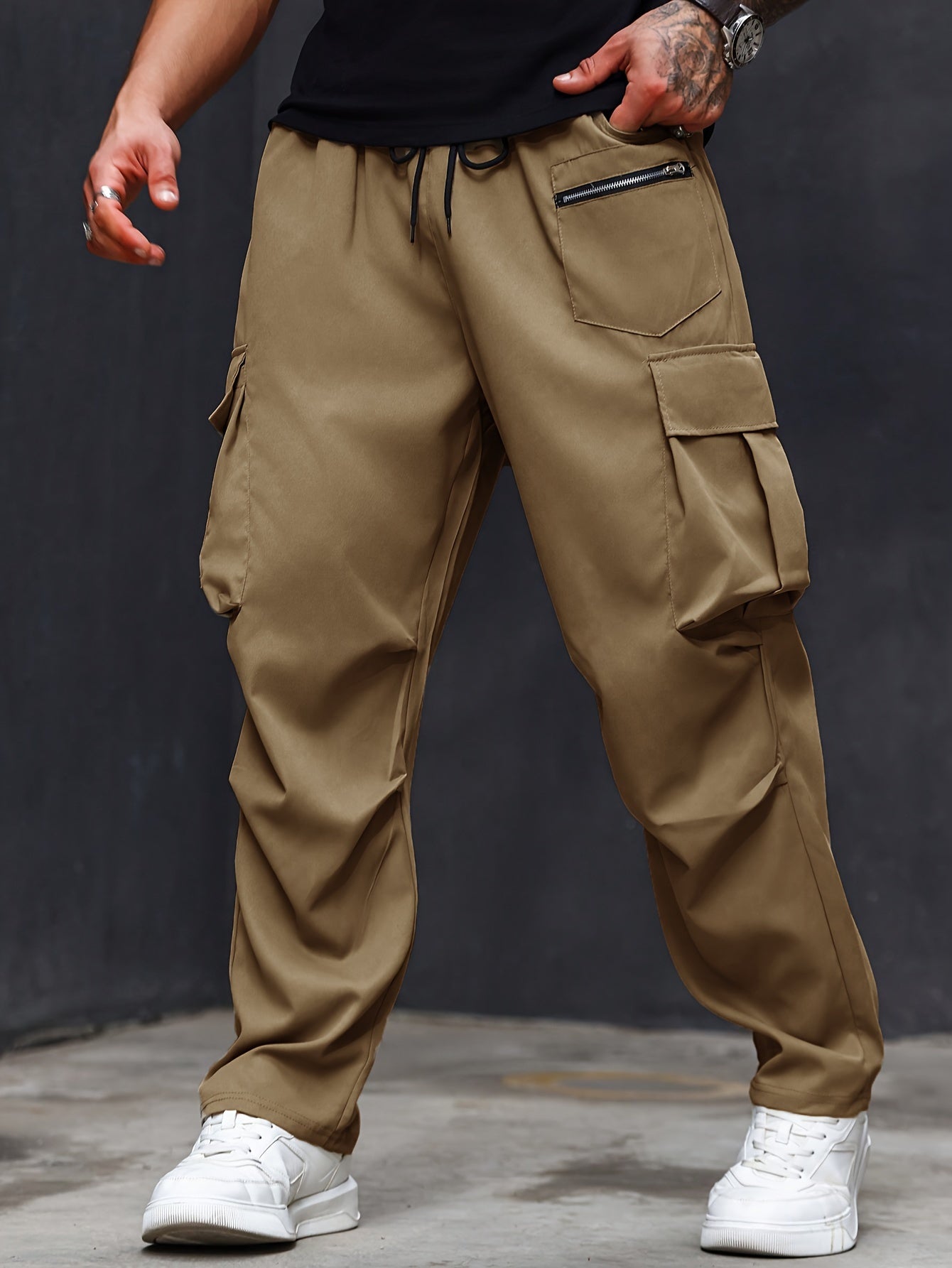 Plus size men's cargo pants with athletic and casual style, regular fit and pockets.