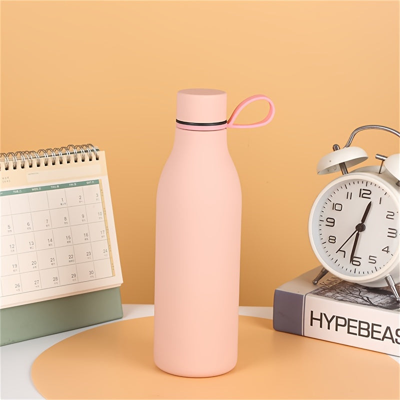 Stainless steel vacuum insulated water bottle with carrying handle, leak-proof design, and 500ml capacity, perfect for outdoor activities and gifts.