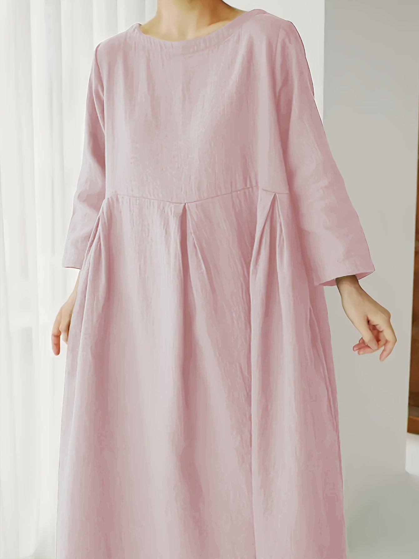 Vintage linen night dress for women with crew neck, long sleeves, pockets, ruffle hem, loose fit, and pullover style. Made of woven, non-stretch fabric suitable for spring/summer/fall.