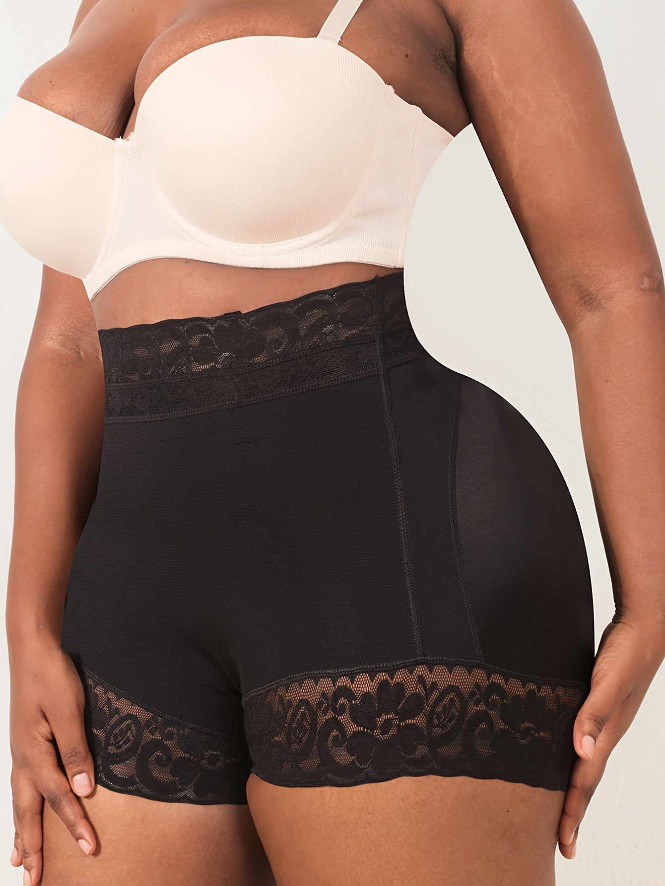 High waist shapewear shorts for plus-size women with lace trim, providing tummy control, butt lifting, and a comfortable fit.