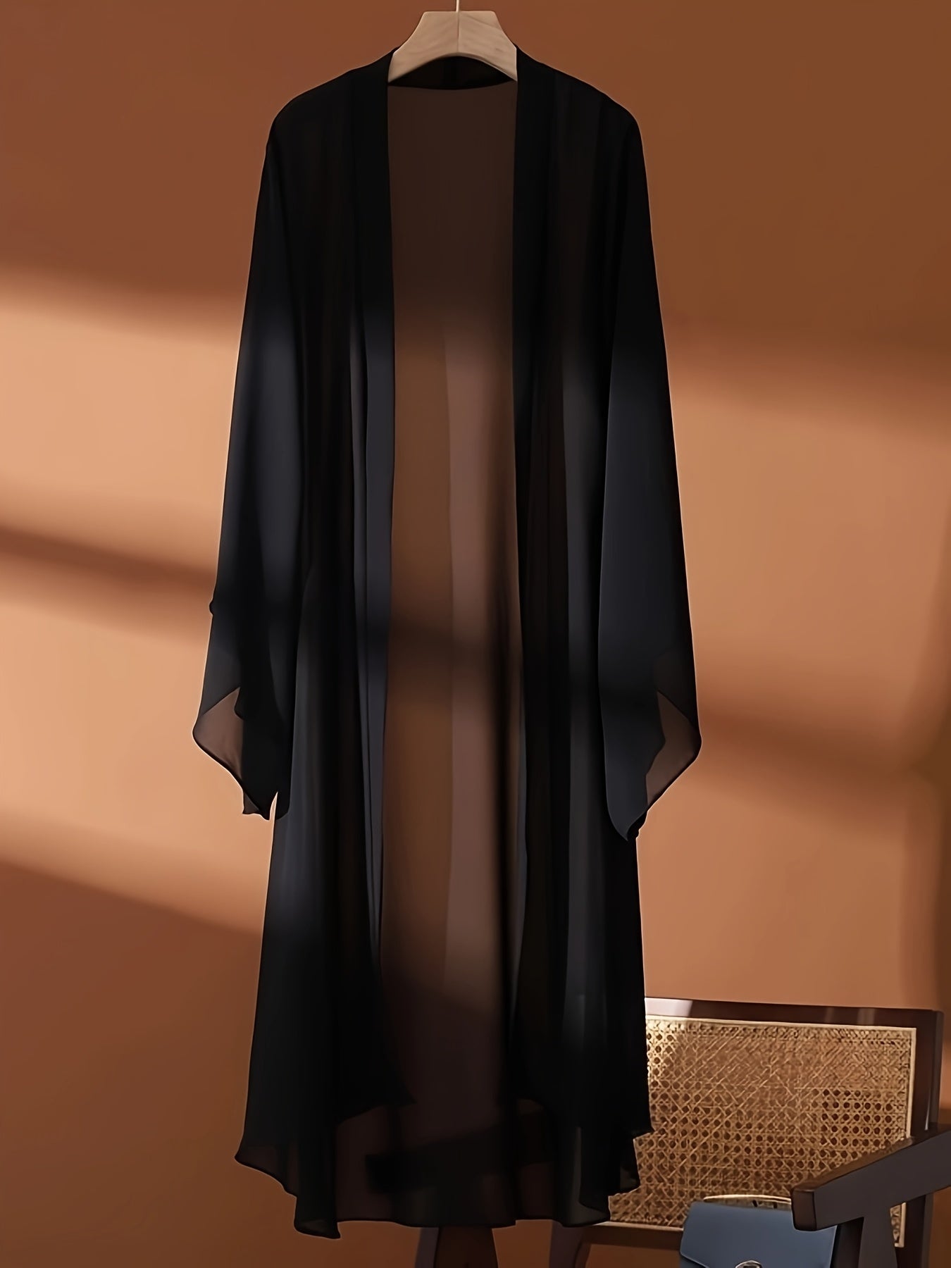 Plus Size Long Sheer Kimono Cardigan made of polyester knit fabric, featuring a solid color design and non-stretch material. This elegant and lightweight outerwear is perfect for casual