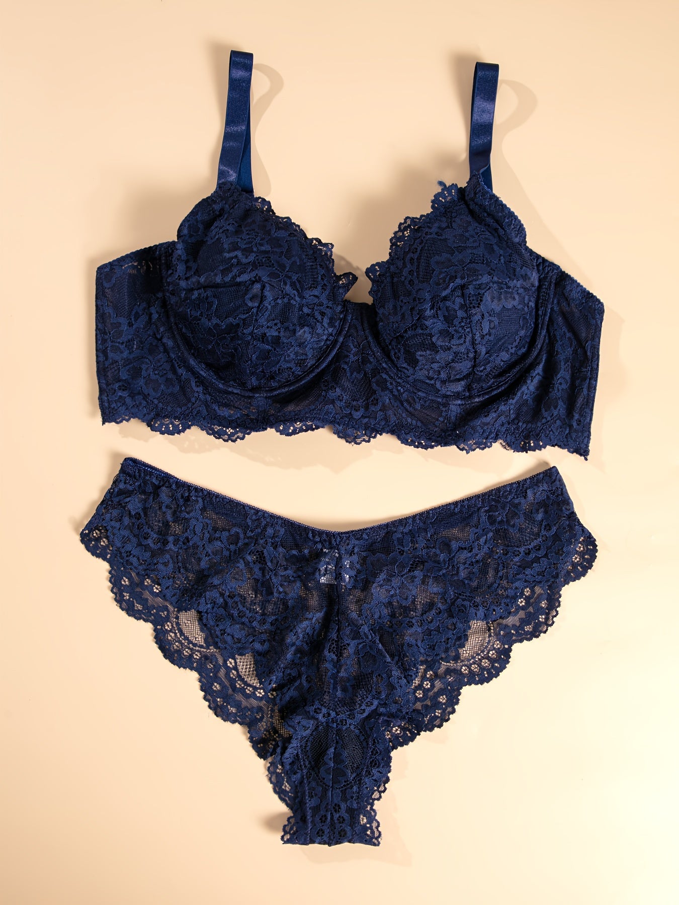 Plus size floral lace lingerie set for women, including bra and panty.