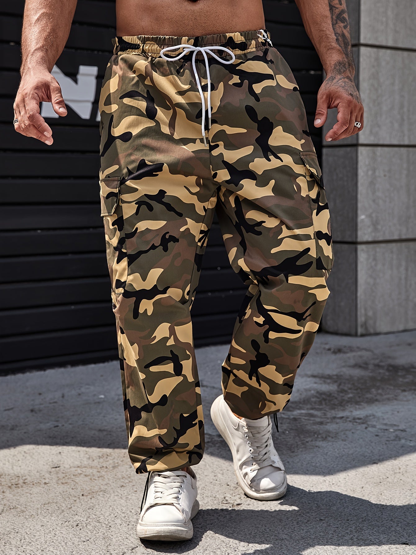 Men's plus size camo cargo pants, made of durable polyester with drawstring waist and multi-pocket design for outdoor activities.