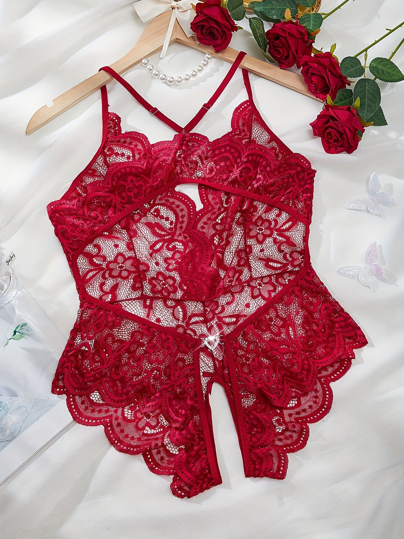 Seductive lace bodysuit with easy access crotch opening and sparkling love buckle.