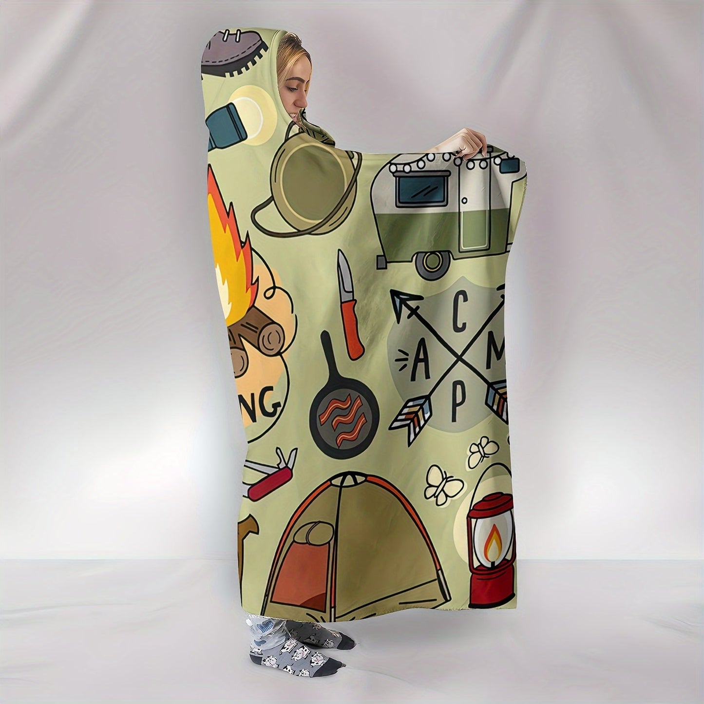 Stay warm and cozy with this versatile Camping Hooded Blanket. Perfect for those chilly nights by the fire or even just lounging on the sofa. This thick, soft blanket is ideal for camping, traveling, or simply nap time. Transform it into a magical cape