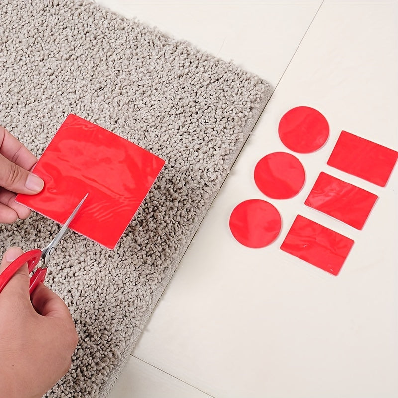 4-Pack of Double-Sided Non-Slip Carpet Stickers for Household Use. These stickers are designed to keep carpets in place without leaving marks on the floor. They are versatile and can be cut into different shapes for various uses.