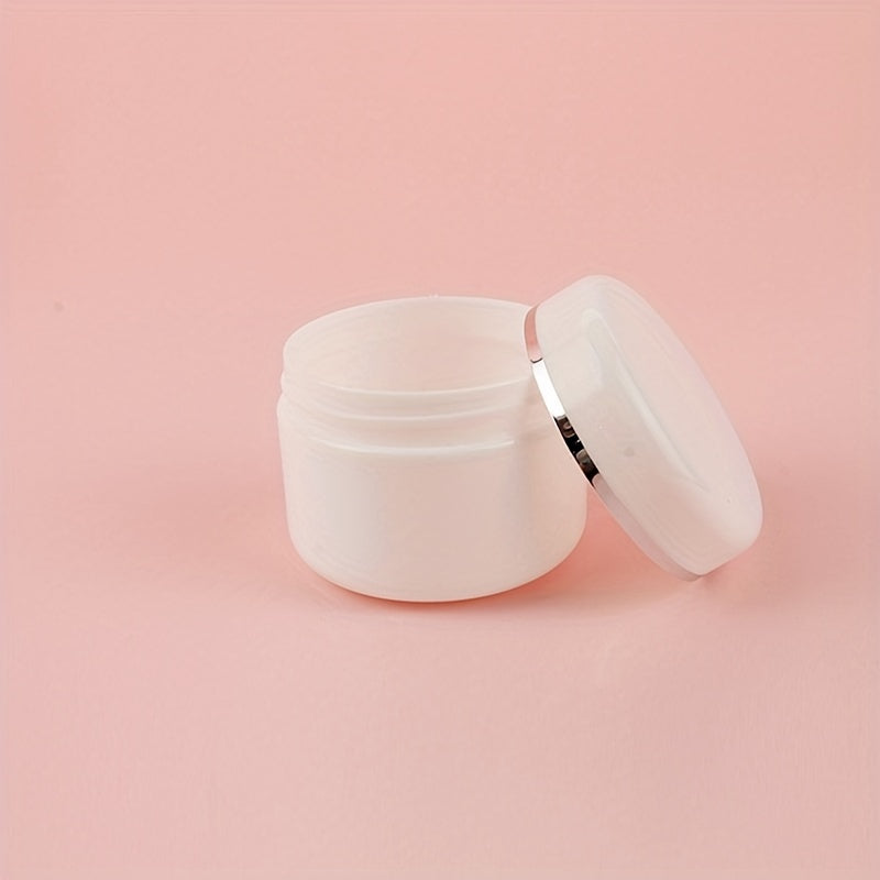 20pcs of 20ml white plastic cream jars are refillable sample bottles for cosmetics, makeup, and skincare, ideal for travel and storage.