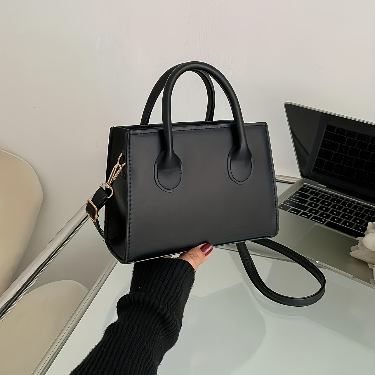 Mini square handbag for women, versatile for casual and formal occasions, with zipper closure and adjustable shoulder strap.