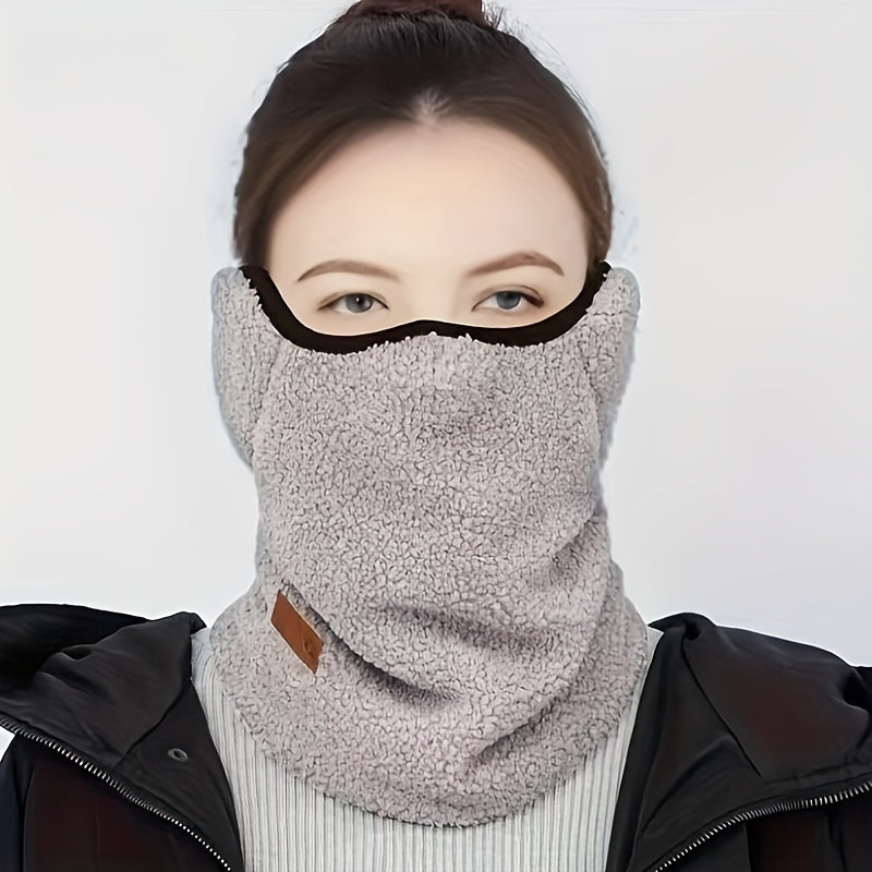 Stay warm and stylish this winter with the Boho Style Women's Fleece Neck Gaiter. This windproof scarf features earflaps and is made of thickened polyester for ultimate warmth and comfort. Perfect for outdoor activities like cycling, this knitted scarf