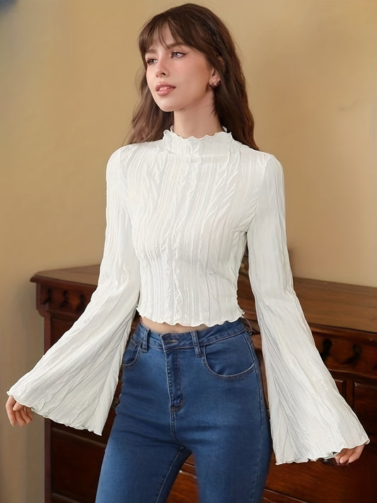 Textured cropped top with flared sleeves and lettuce trim mock neck, ideal for spring and fall.