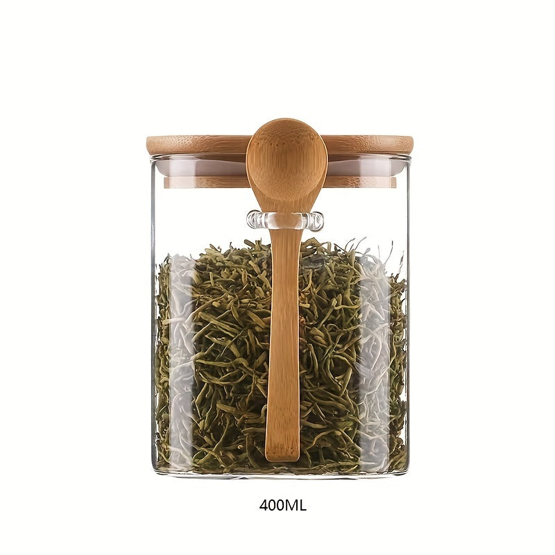 Airtight glass jar with bamboo lid and spoon for kitchen storage, perfect for spices, rice, coffee, candies, etc. Pearl packaging included.