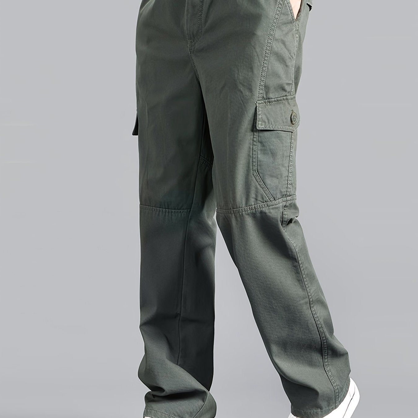 Casual cotton cargo pants for men, with solid color, multi-pocket design, loose fit, and non-stretch woven fabric. Ideal for daily wear in the Spring/Fall Collection.