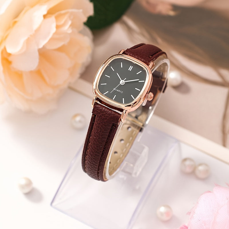 Elegant women's wrist watch with synthetic leather band, quartz movement, rectangular dial, pointer display, electronic drive, button battery powered.