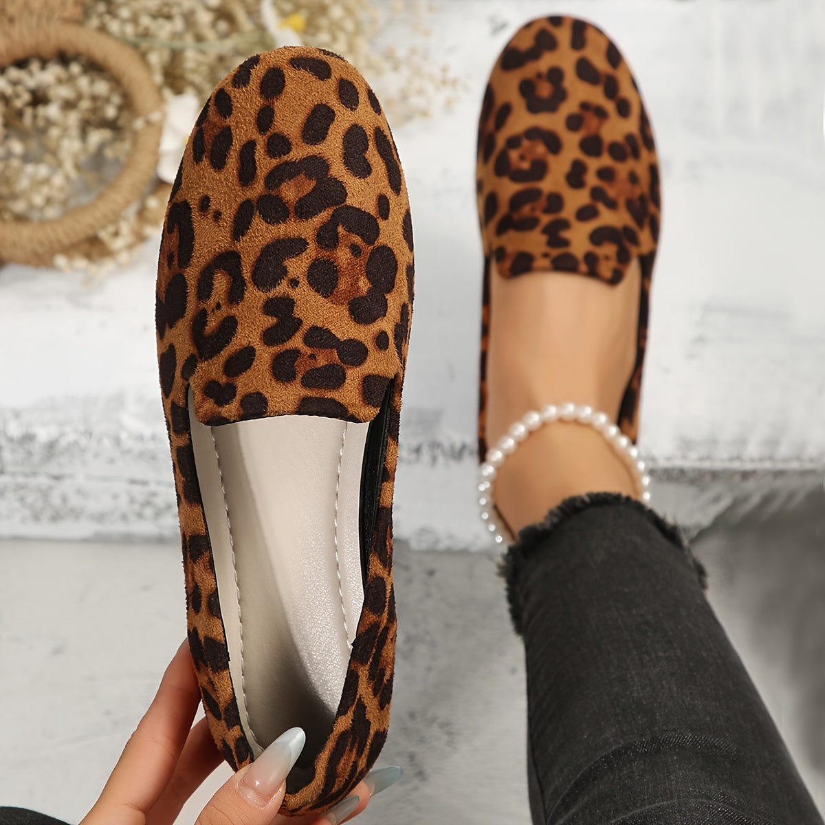 Leopard print women's flats with lightweight slip-on design, plain toe, fabric upper, and plastic sole - perfect for all seasons and versatile boat-style footwear.