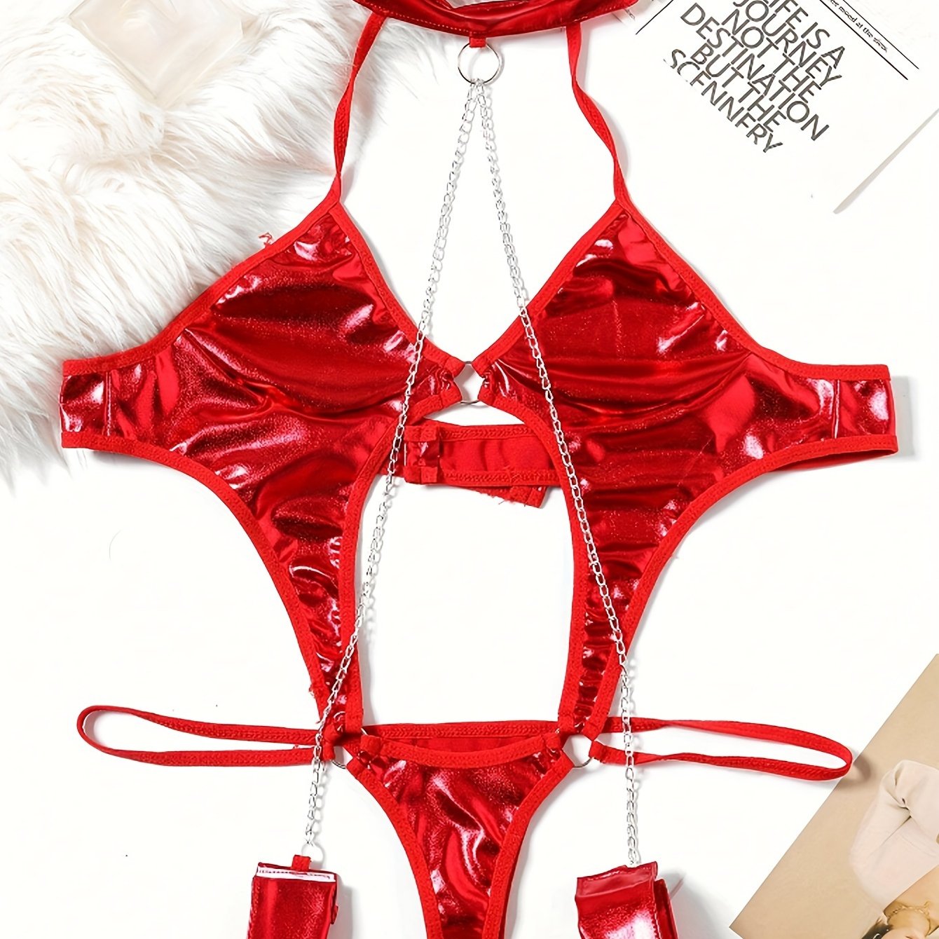 Red patent leather bodysuit with metal chain details, adult costume with bondage elements, solid color, knit fabric, single piece design.