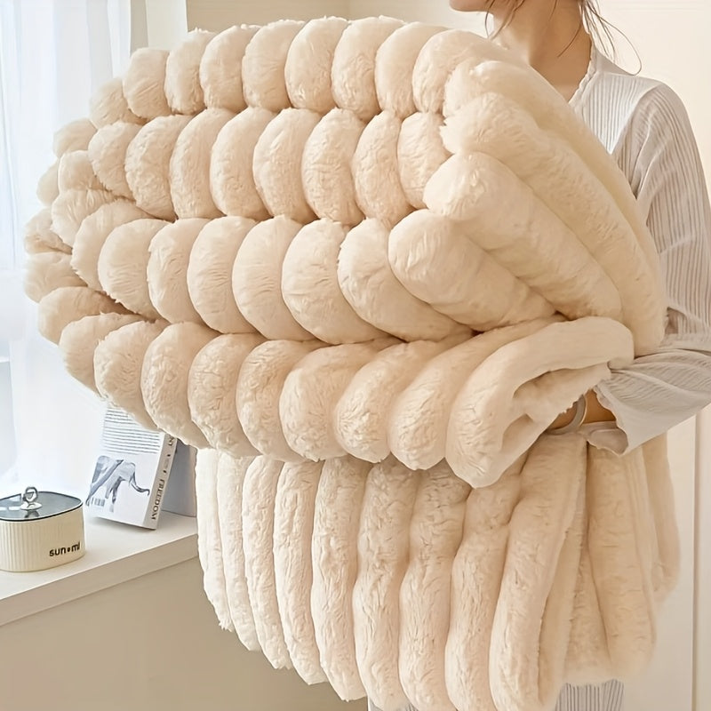 Get cozy with this multifunctional blanket made of ultra-soft milk fleece. Featuring a modern striped texture, this blanket is perfect for all-season comfort on your bed, sofa, or even while camping. Machine washable for easy care, this blanket is an