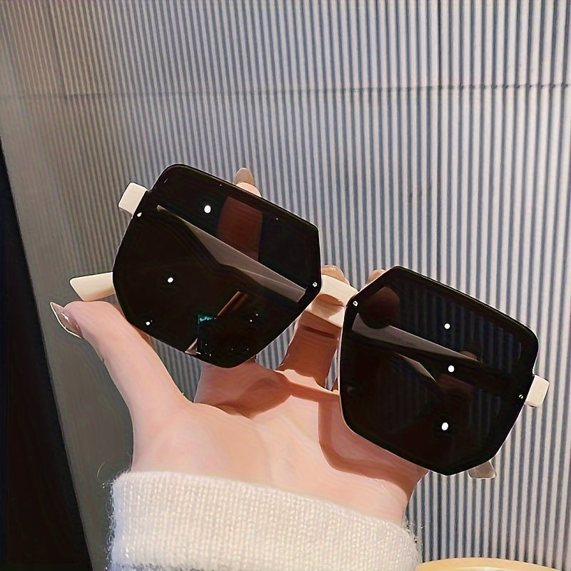 Large square plastic sunglasses for outdoor activities.