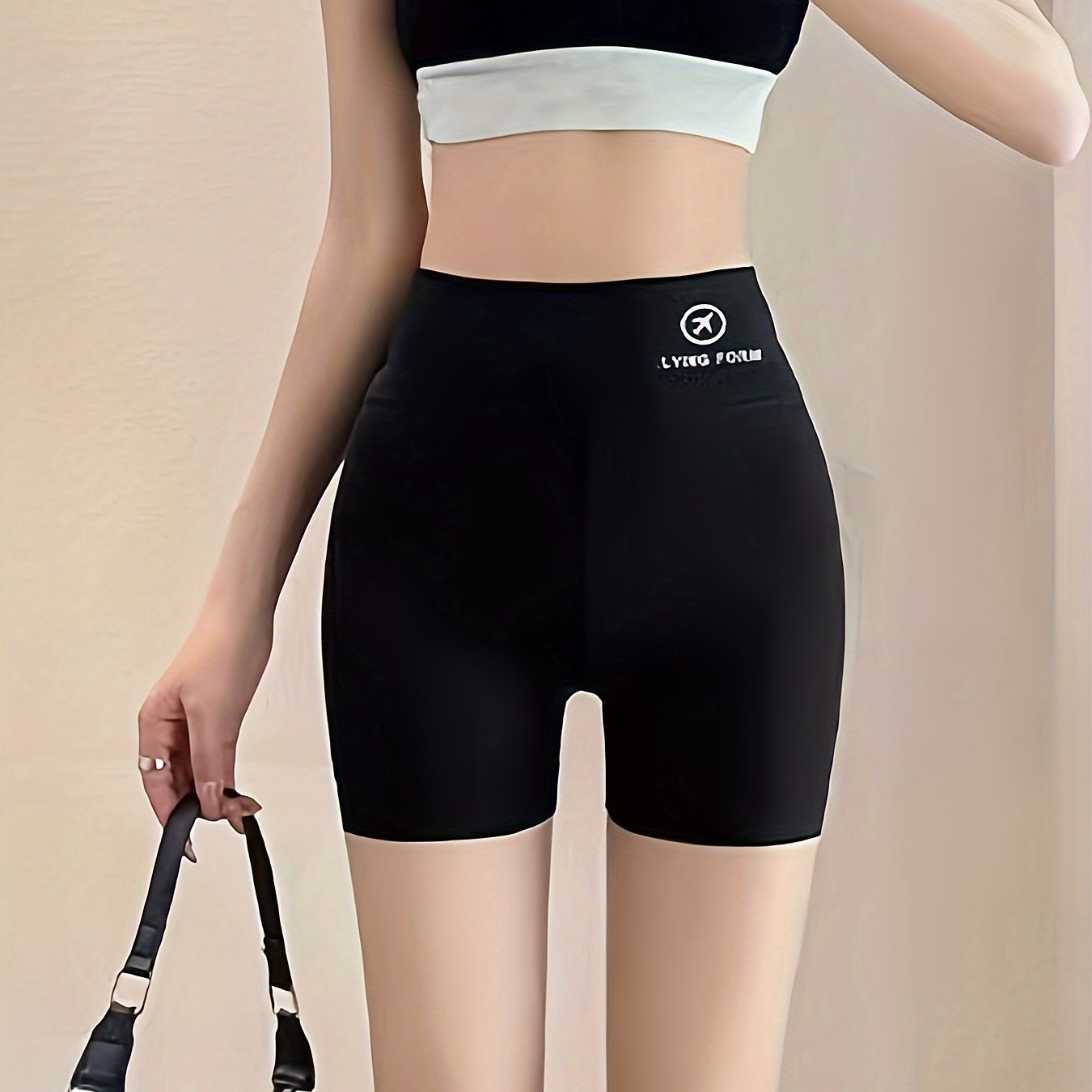 High-waist shorts for women in a seamless, casual style. Made from thin, breathable fabric perfect for summer. Suitable for spring and autumn wear at home. Features a 3-point length design.