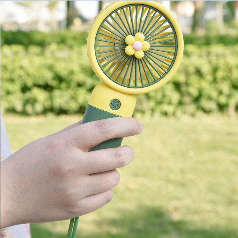 Summer flower color block portable handheld mini fan with USB chargeable feature.