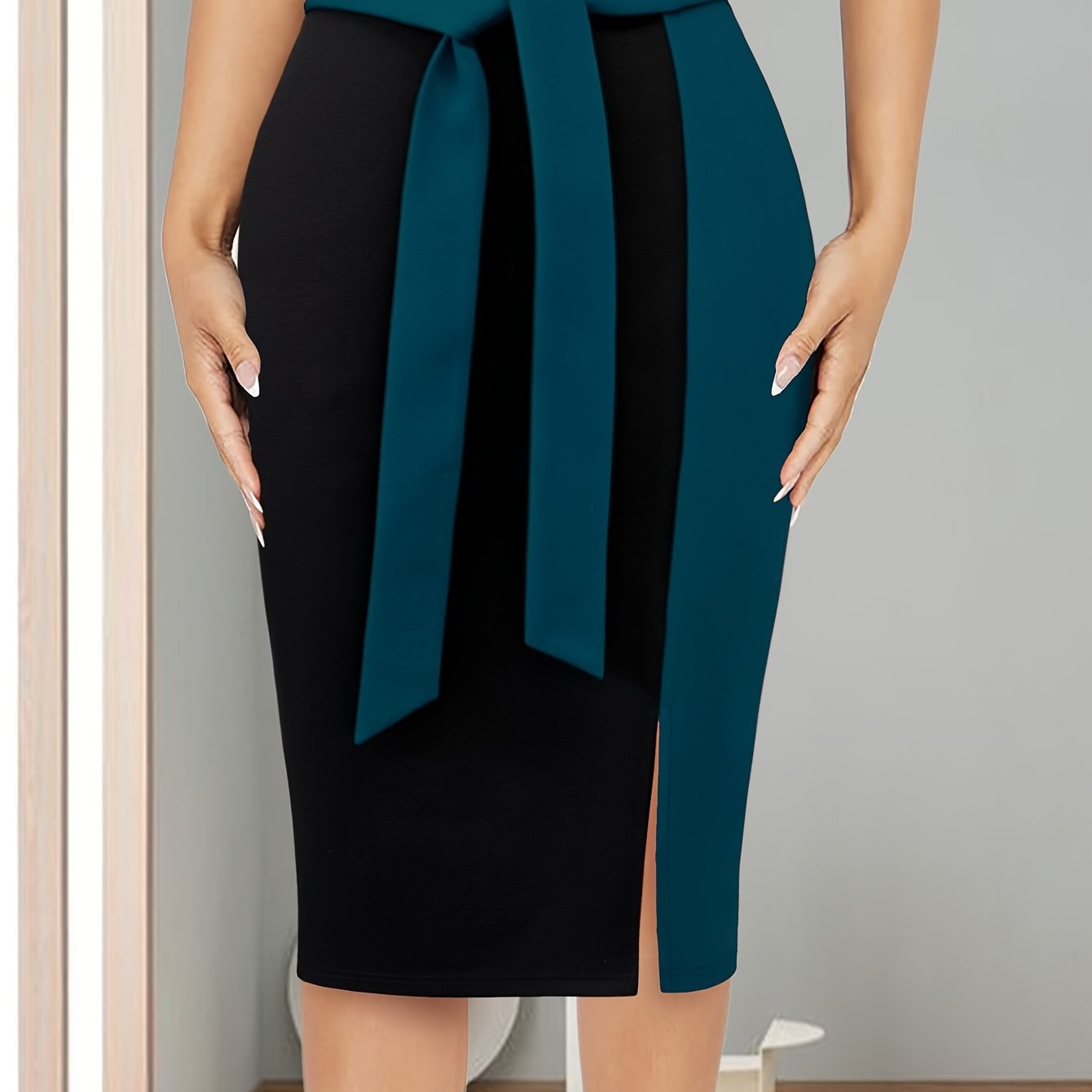 Stylish Color Block Tie-Waist Midi Skirt made of stretchy rayon blend with maroon & black design. Suitable for office or casual wear in spring/summer. Machine washable and comfortable fit.