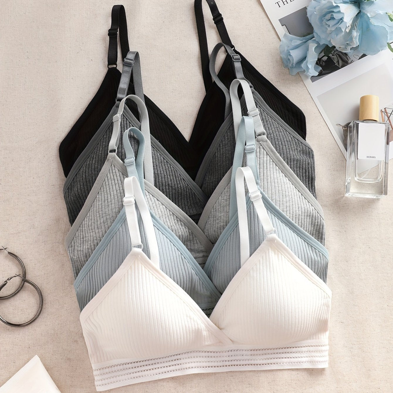 Set of 5 elegant wireless bras with ribbed texture design, soft breathable fabric, and adjustable straps for daily wear lingerie.