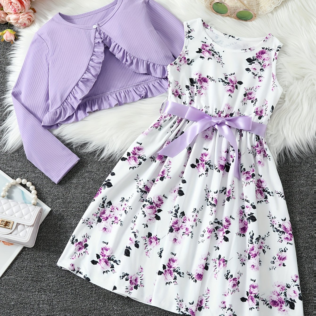 2-piece girls' spring/fall dress set with floral umbrella skirt and crew neck knit top. Made of 100% polyester, features long sleeve ruffle hem and button detail. Great for daily wear and