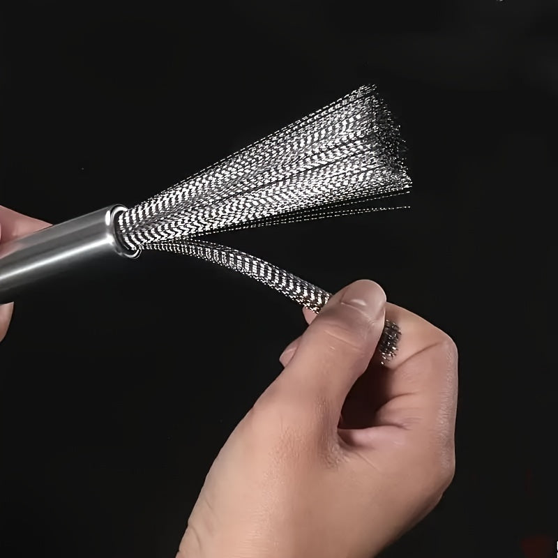 A stainless steel kitchen brush with a long handle and multiple functions, designed for cleaning pots and pans.