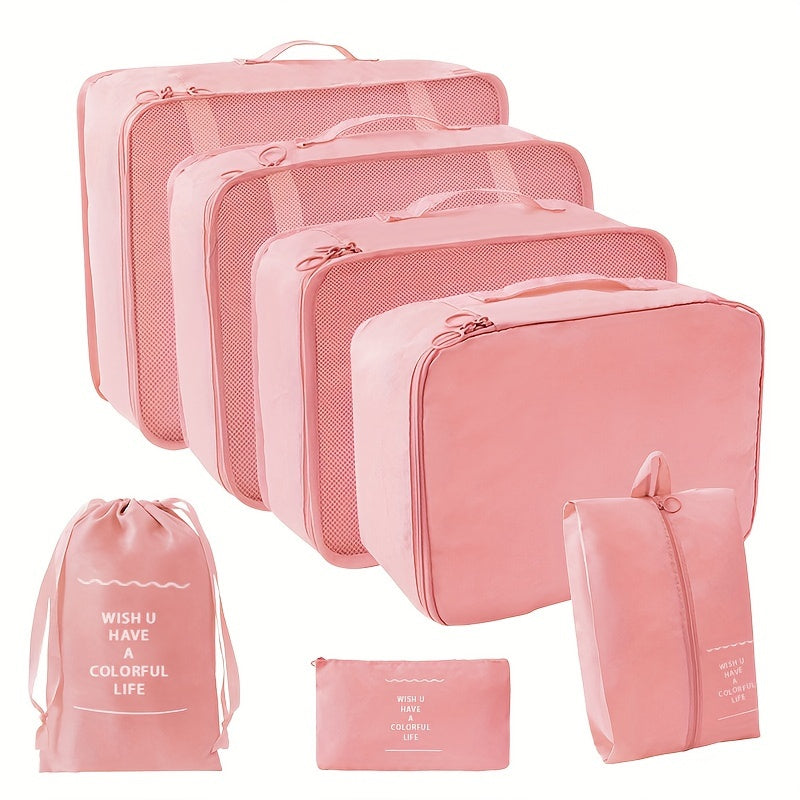 Pink Travel Organizer Set with 8 pieces, adjustable straps, zip closure, and "WISH U HAVE A COLORFUL LIFE" motif, made of polyester for luggage and toiletries.