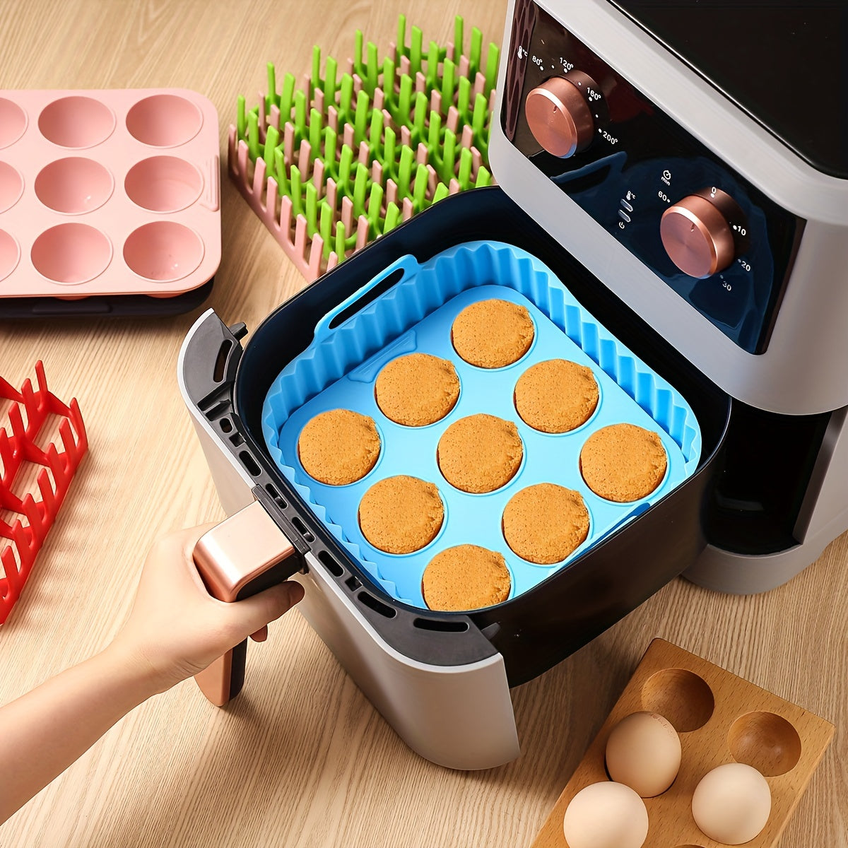 Premium Square Air Fryer Silicone Set includes a bacon & hot dog rack, 9-cavity cake mold, and air fryer pan. This BPA-free and dishwasher safe set is compatible with 7QT+ air fryers.