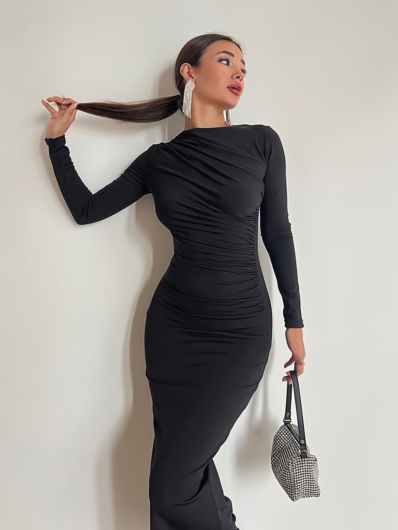 Women's long sleeve pencil dress made from 95% polyester and 5% elastane knit fabric. Features solid color sheath with draped detail, conventional collar, all-season long length, and side