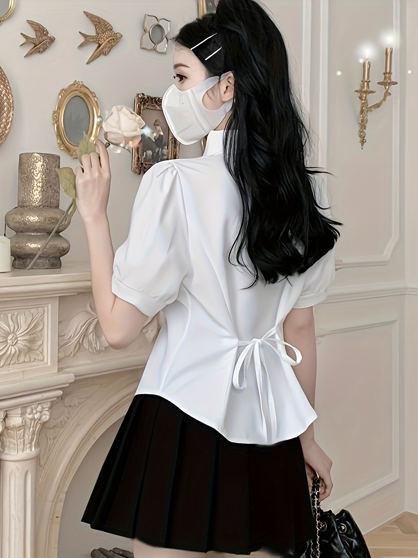 Stylish white blouse with tie-waist detail for women - perfect for casual wear.