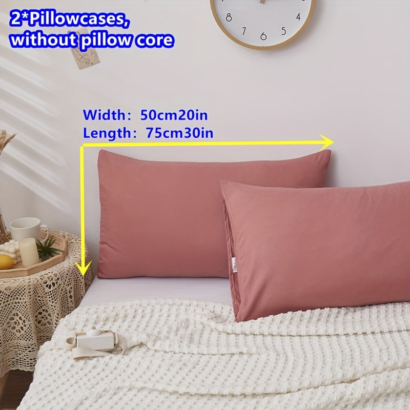 Two polyester pillowcases with a 90g weight, featuring a multi-color printed design with a mix of floral patterns. These pocket pillowcases are suitable for household use.