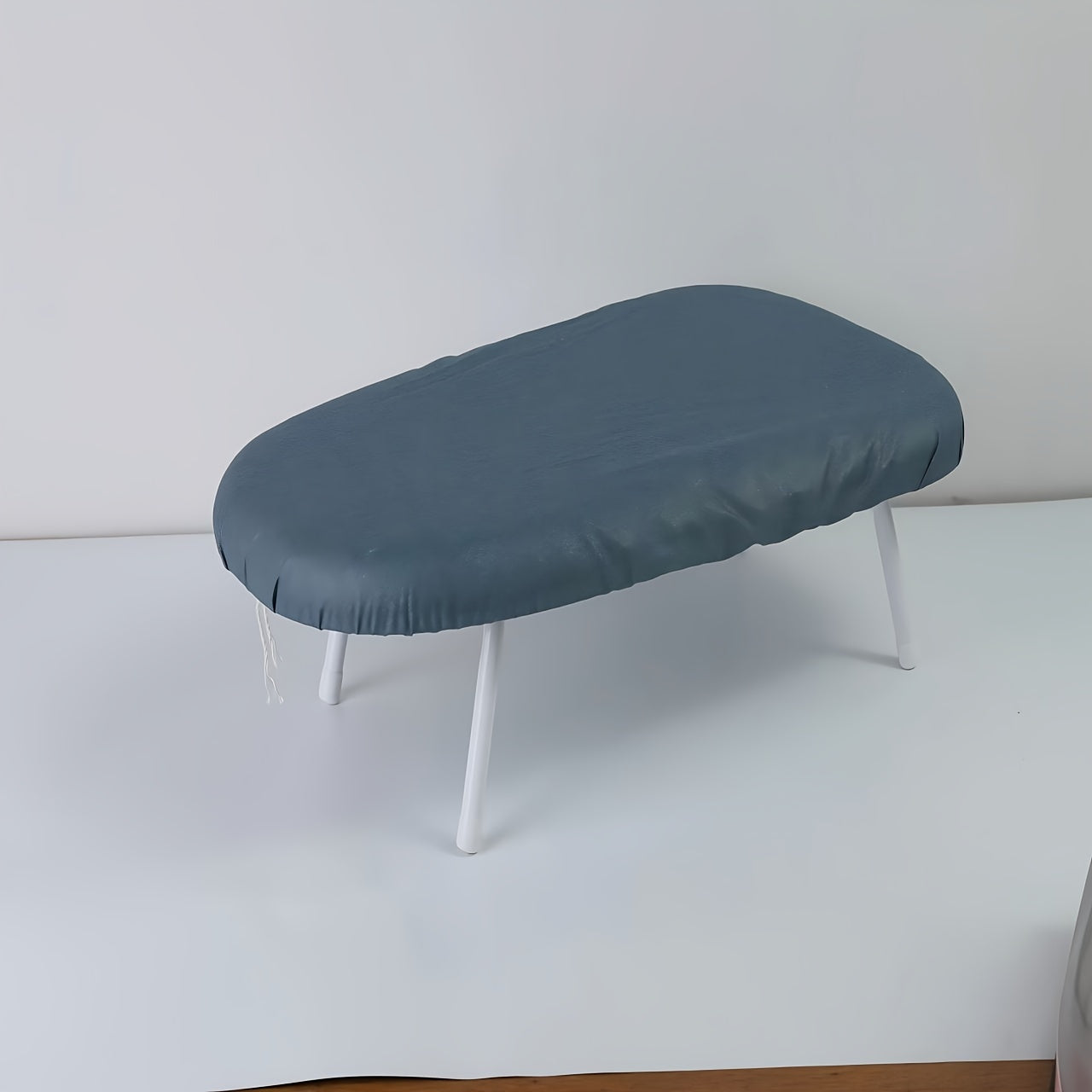 1 piece of Home Ironing Clothes Collar Cuffs that can be used at the Office, for Leisure activities, and for ironing on the Dining Table. It is a Foldable Ironing Board.