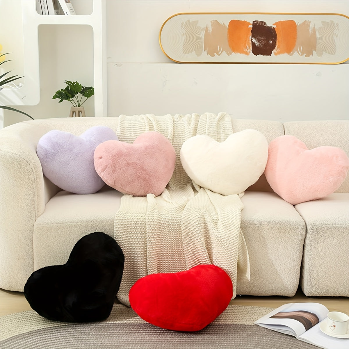 Heart-shaped plush pillow in assorted colors, machine-washable and suitable for all seasons, adds a romantic touch to your living space.