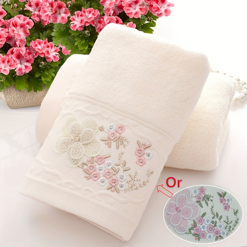 2 Cotton embroidered hand towels with quick-drying, absorbent material for home bathrooms.