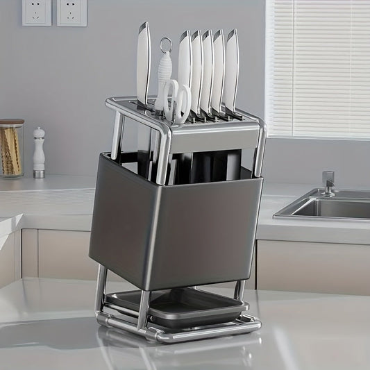 Keep your kitchen knives organized with this stylish Stainless Steel Knife Block. The antibacterial design features a water-draining system for cleanliness, while the ventilated rack allows for easy access. Multiple inserts provide ample storage space