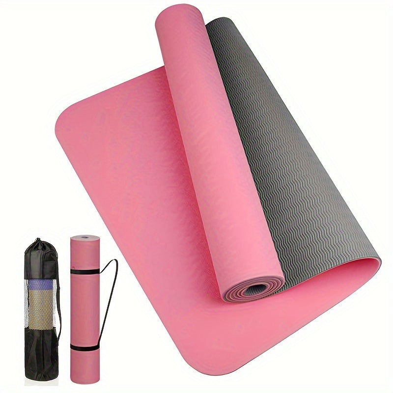 Non-slip yoga mat with textured surface and strap for yoga, pilates, and fitness workouts.