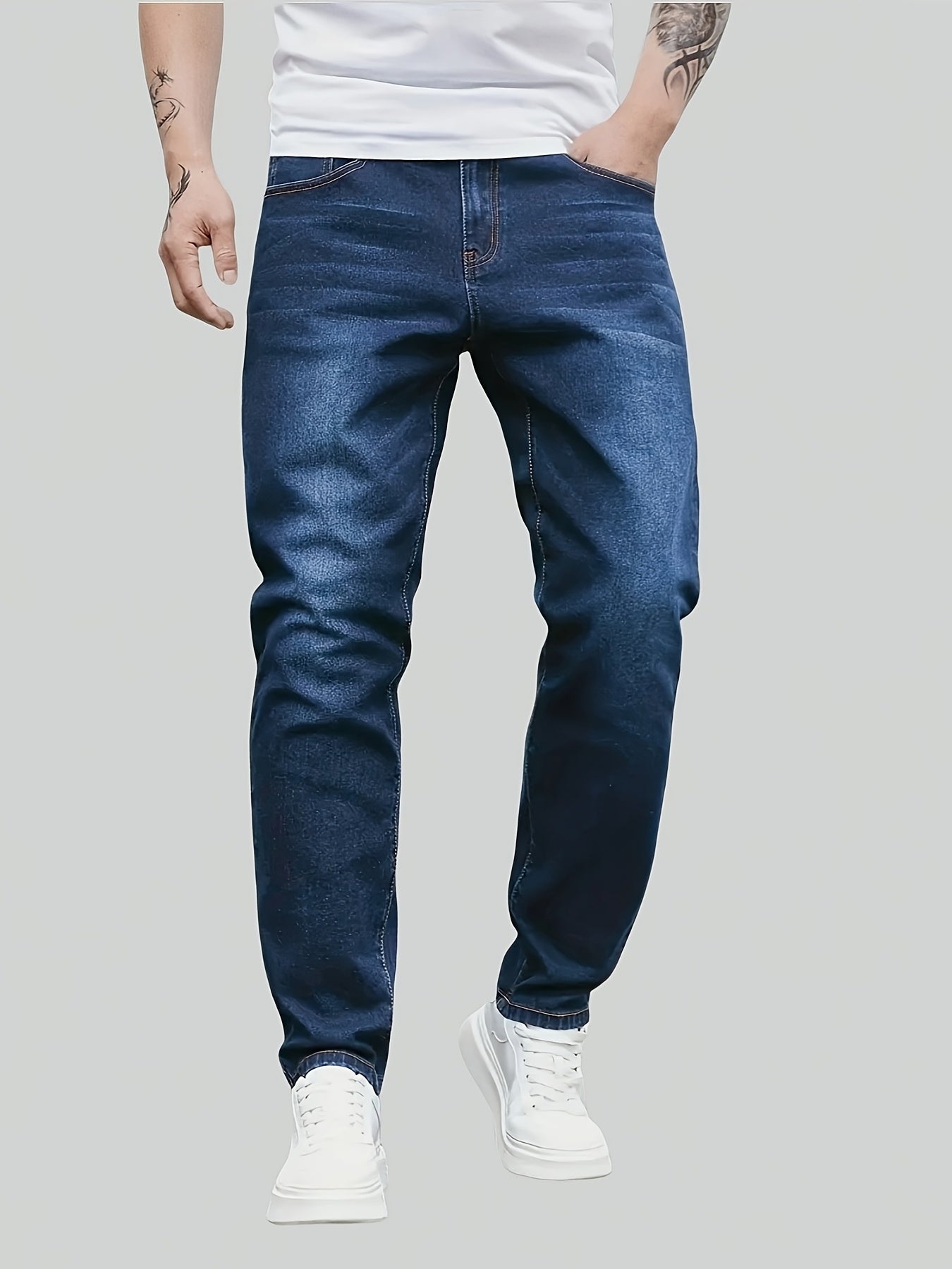 Men's denim jeans in plus size with a straight leg cut, made of 65% cotton, 33.7% polyester, and 1.3% spandex. Features medium stretch, all-season comfort, solid washed style, and 370gsm