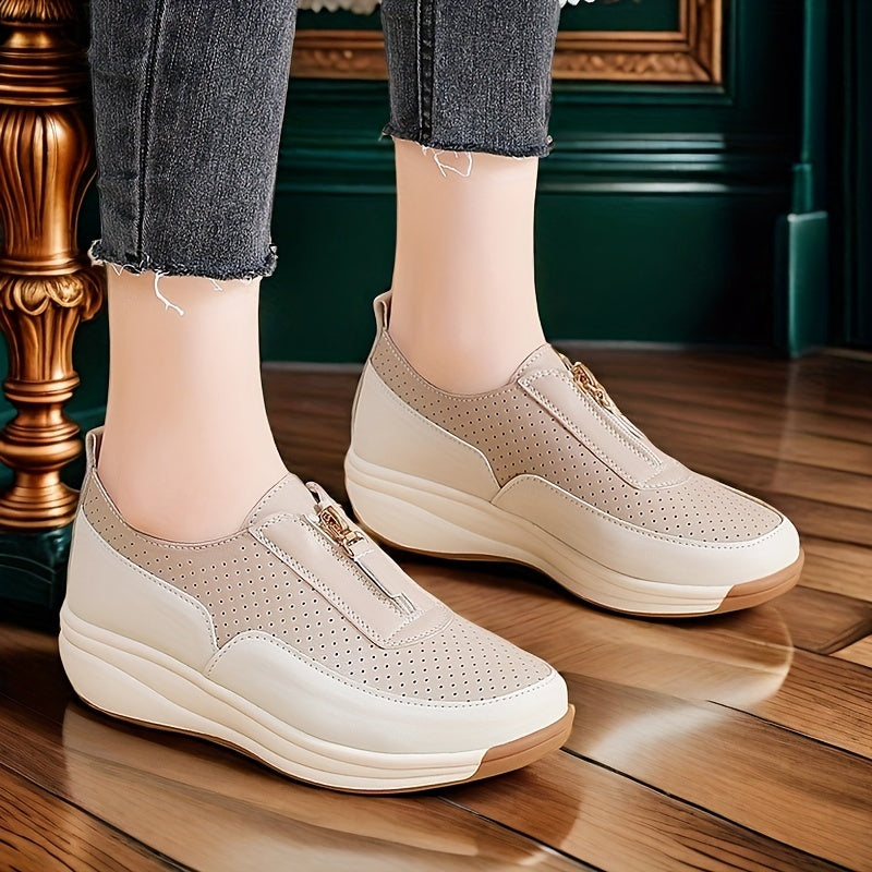 Beige perforated women's casual sneakers with zipper detail, thick sole, and anti-slip features.