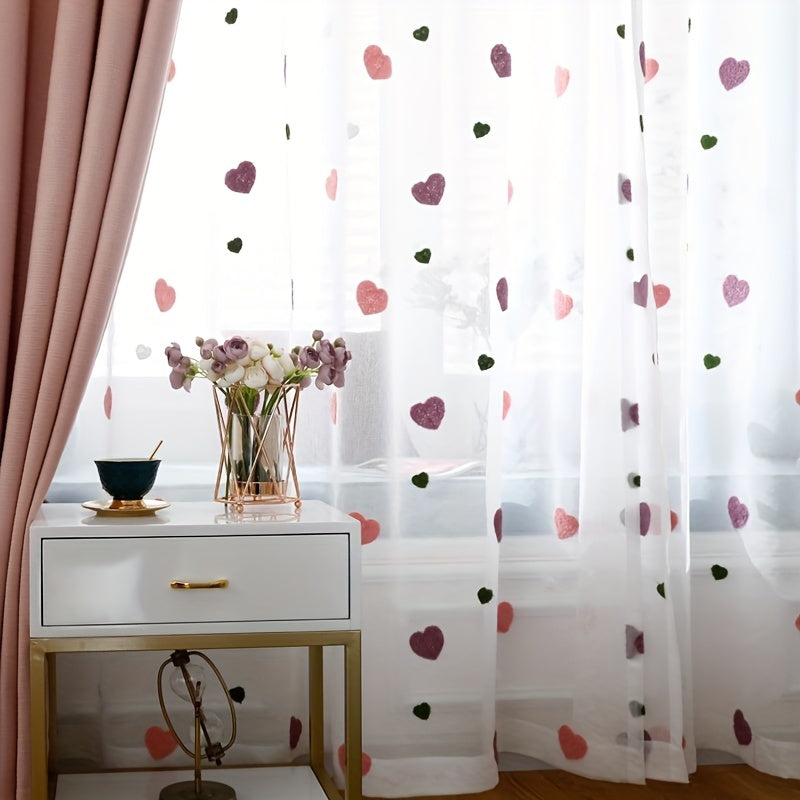 Modern heart pattern sheer curtain panel in pink, grommet top, washable polyester voile for youngsters' room; all-season decorative unlined curtain with eyelet, perfect for a princess-themed kid's bedroom.