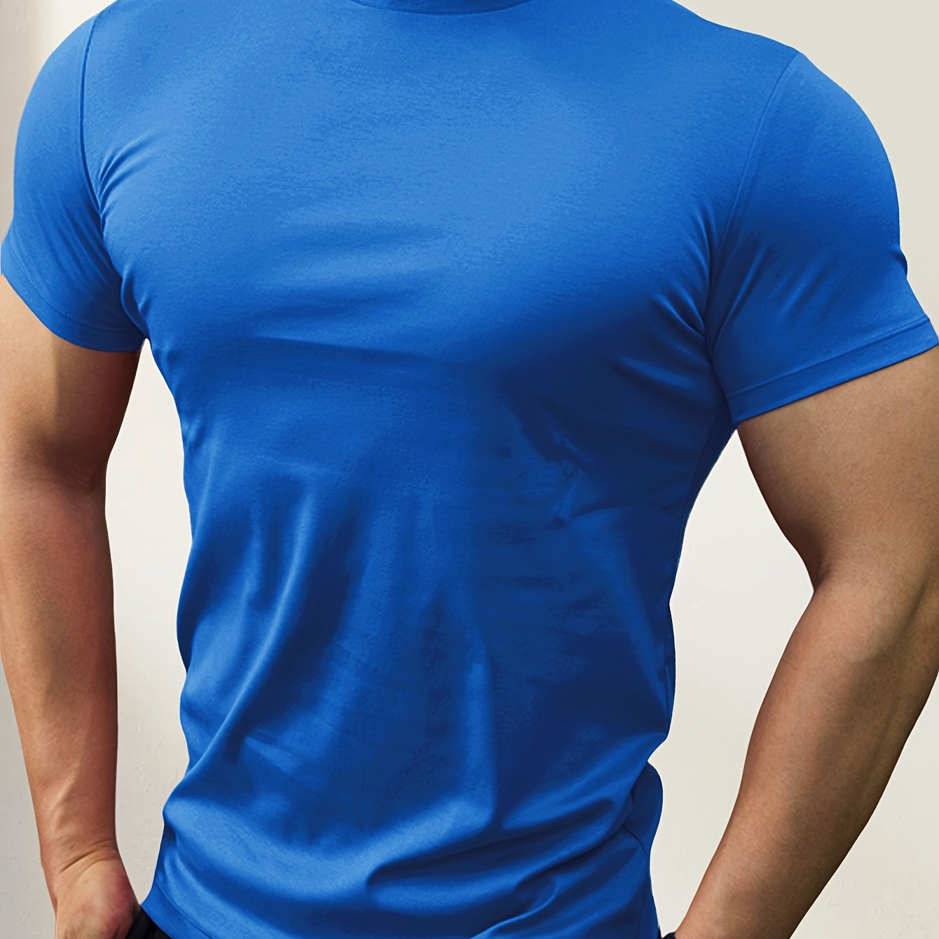 Men's slim-fit short-sleeve t-shirt with stand-up collar, ideal for outdoor activities, gym wear, or layering.