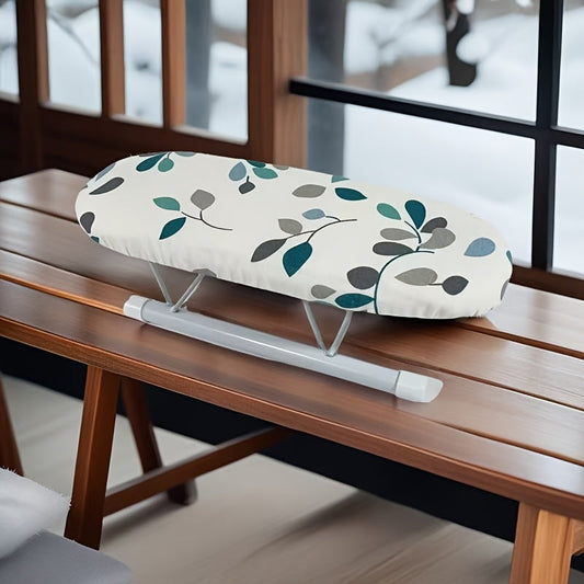 Portable mini ironing board featuring a leaf pattern, perfect for ironing sleeves and collars. Lightweight and easy to transport, no electricity or batteries needed.