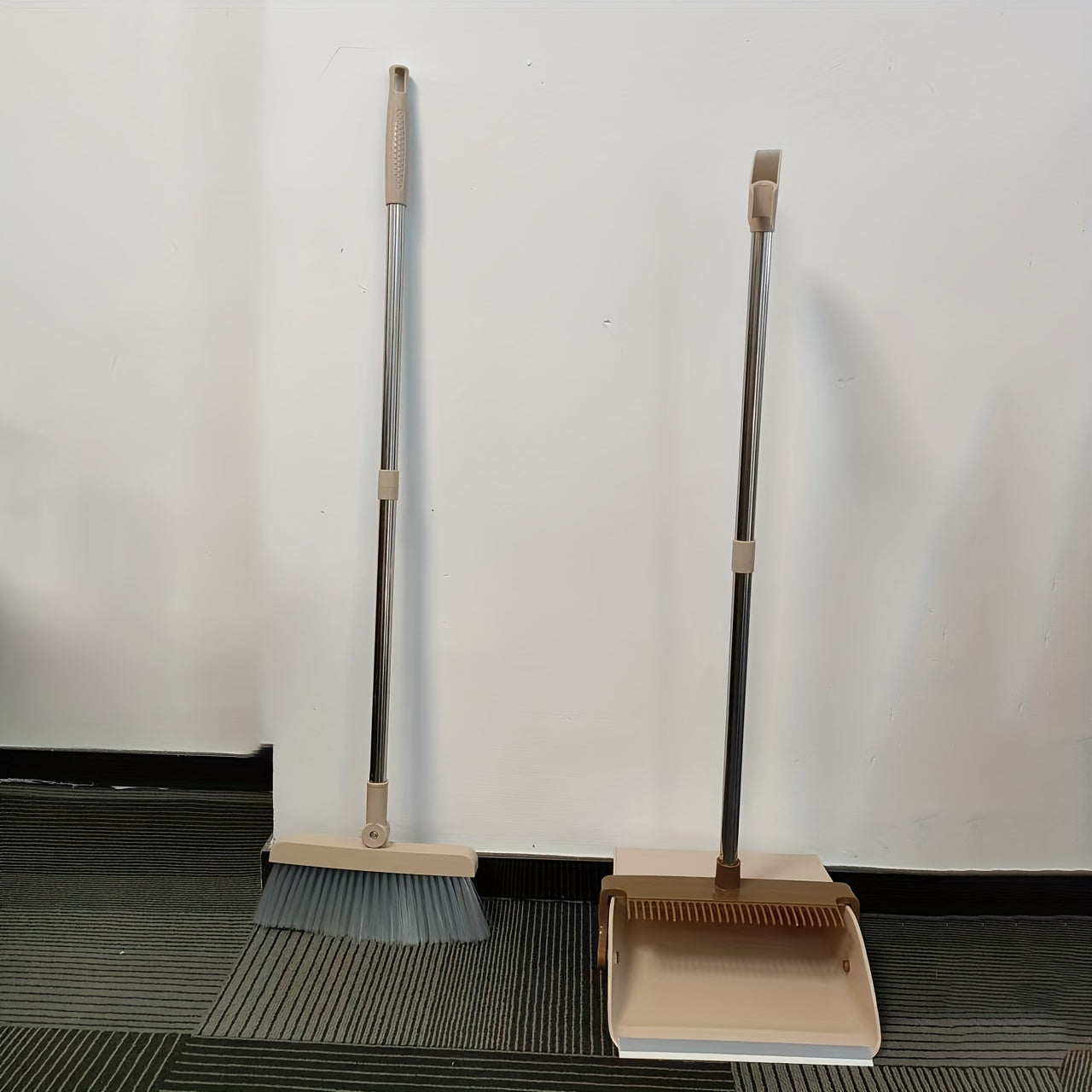 The Multi-Angle Folding Broom and Dustpan Set is equipped with a telescopic handle and comb teeth, making it perfect for cleaning living rooms, bedrooms, kitchens, and floors.