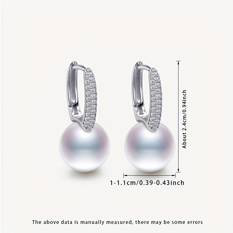 Upgrade your jewelry collection with the sophisticated and timeless MUFAN Elegant Vintage Style Freshwater Pearl Drop Earrings. These stunning earrings feature large 10-11mm round natural gemstones hanging from S925 sterling silver posts. Perfect for