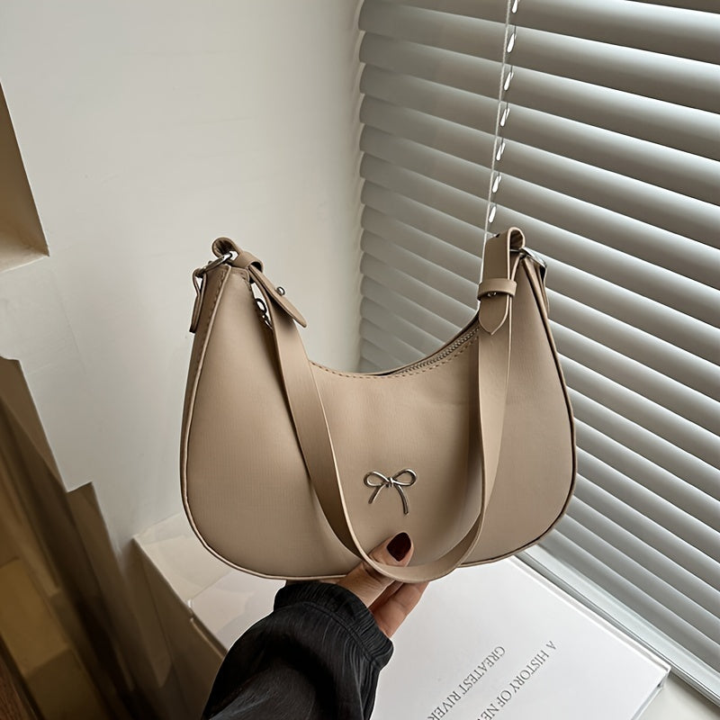 New Korean style shoulder bag with unique design, beautiful and fashionable crescent shape.