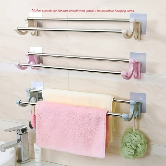 Stainless steel double rod towel bar for bathroom organization.